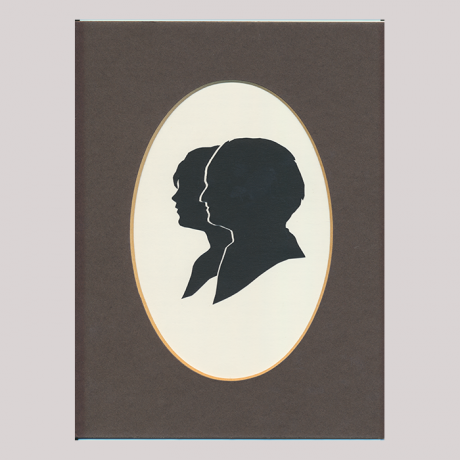 
        Front of silhouette, with man and woman looking left. Close-up the man; in the background the woman.